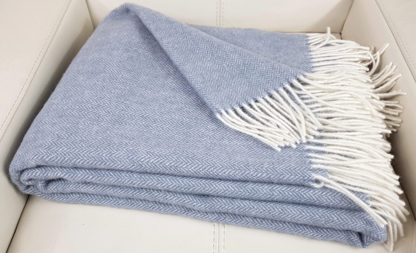 Wolldecken und Wollplaids