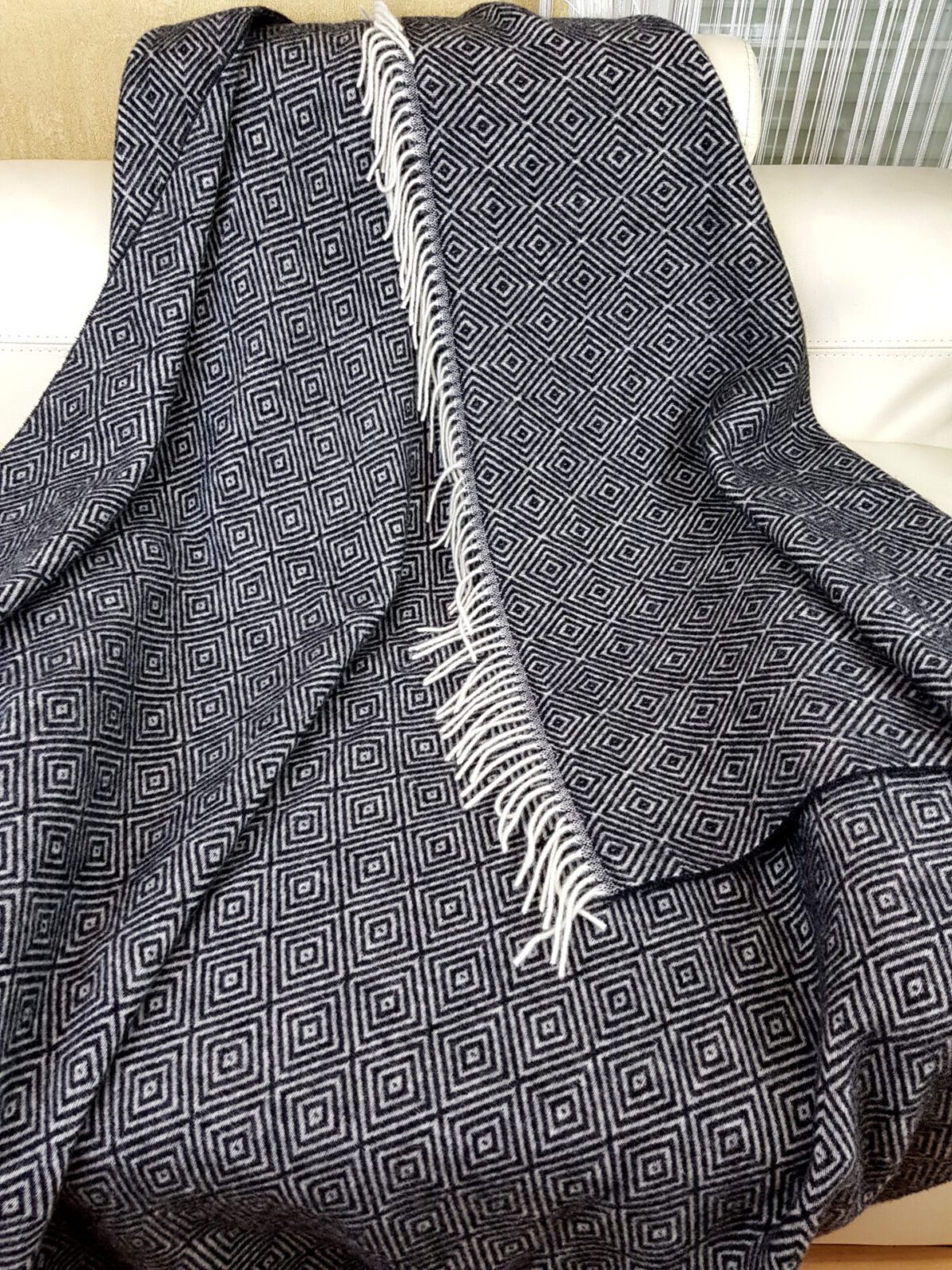 Wolldecken und Wollplaids