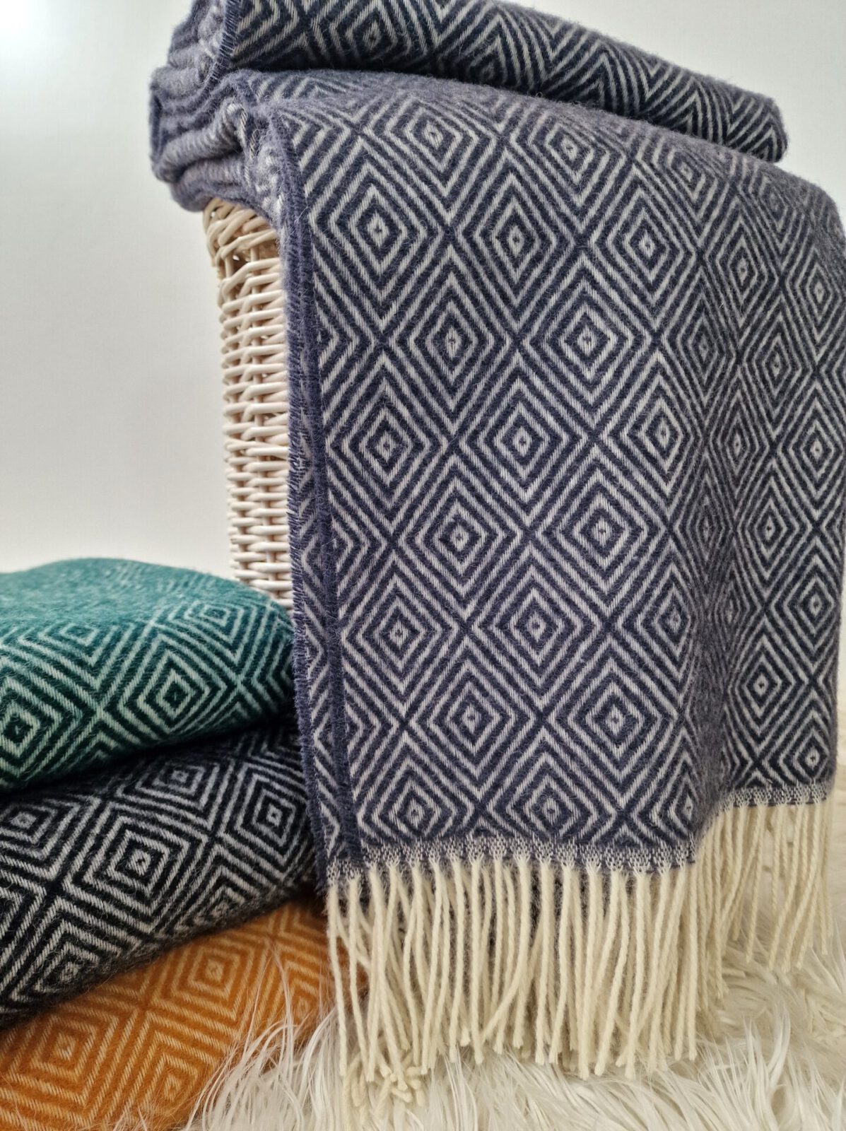 Wolldecken und Wollplaids
