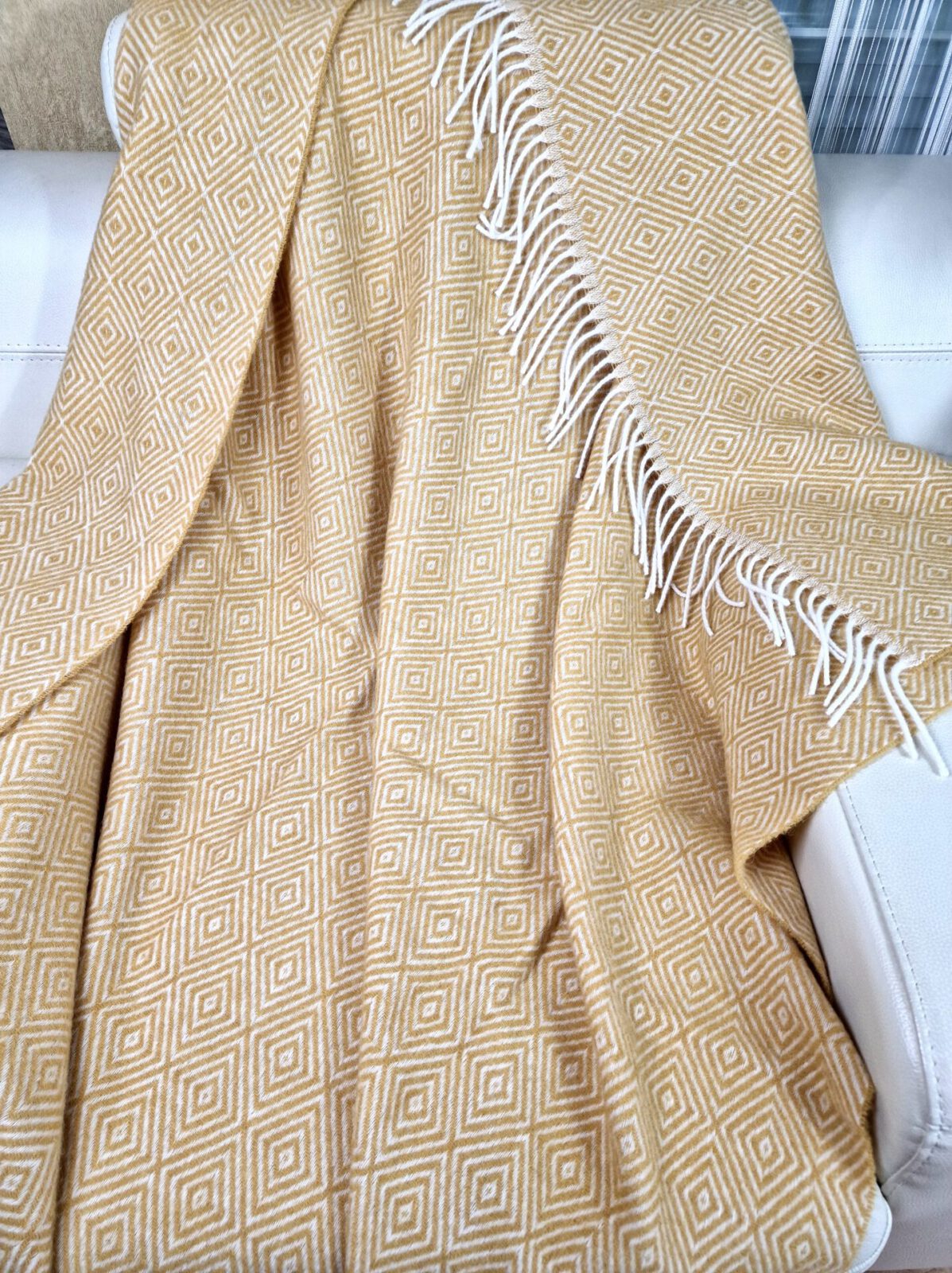 Wolldecken und Wollplaids