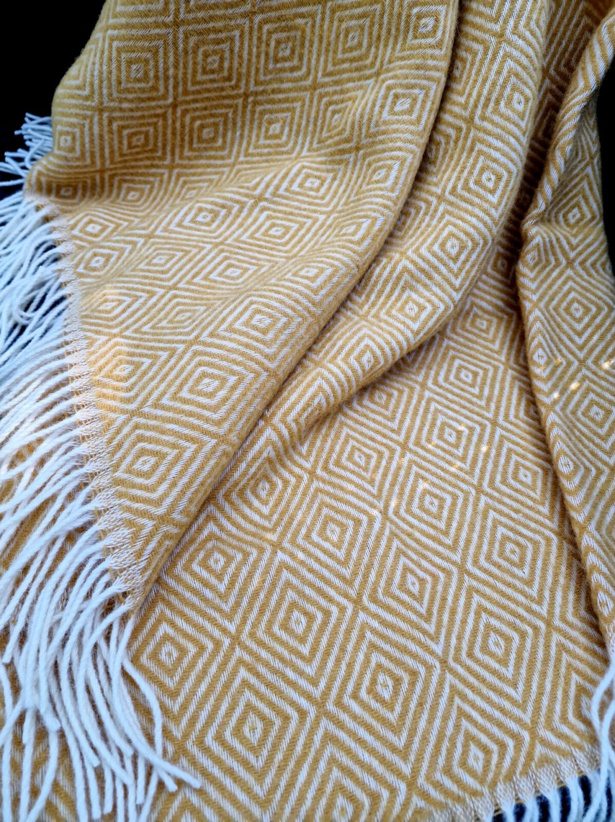 Wolldecken und Wollplaids