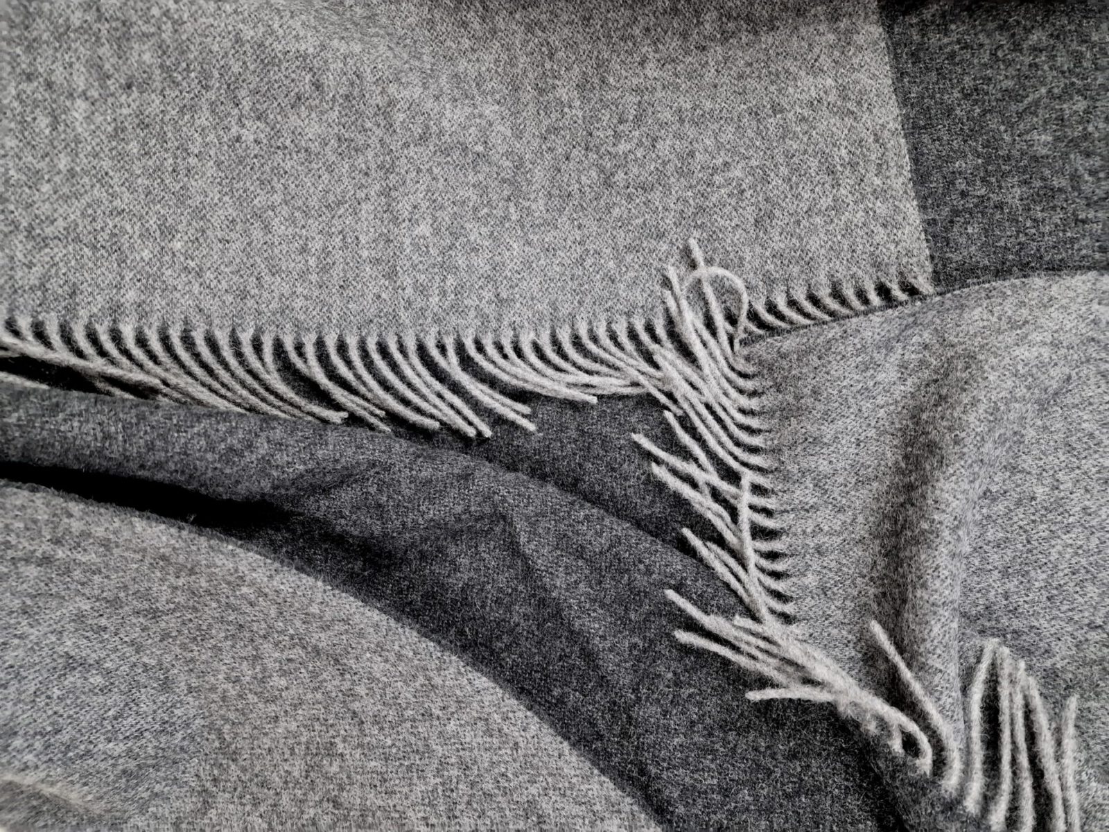 Wolldecken und Wollplaids