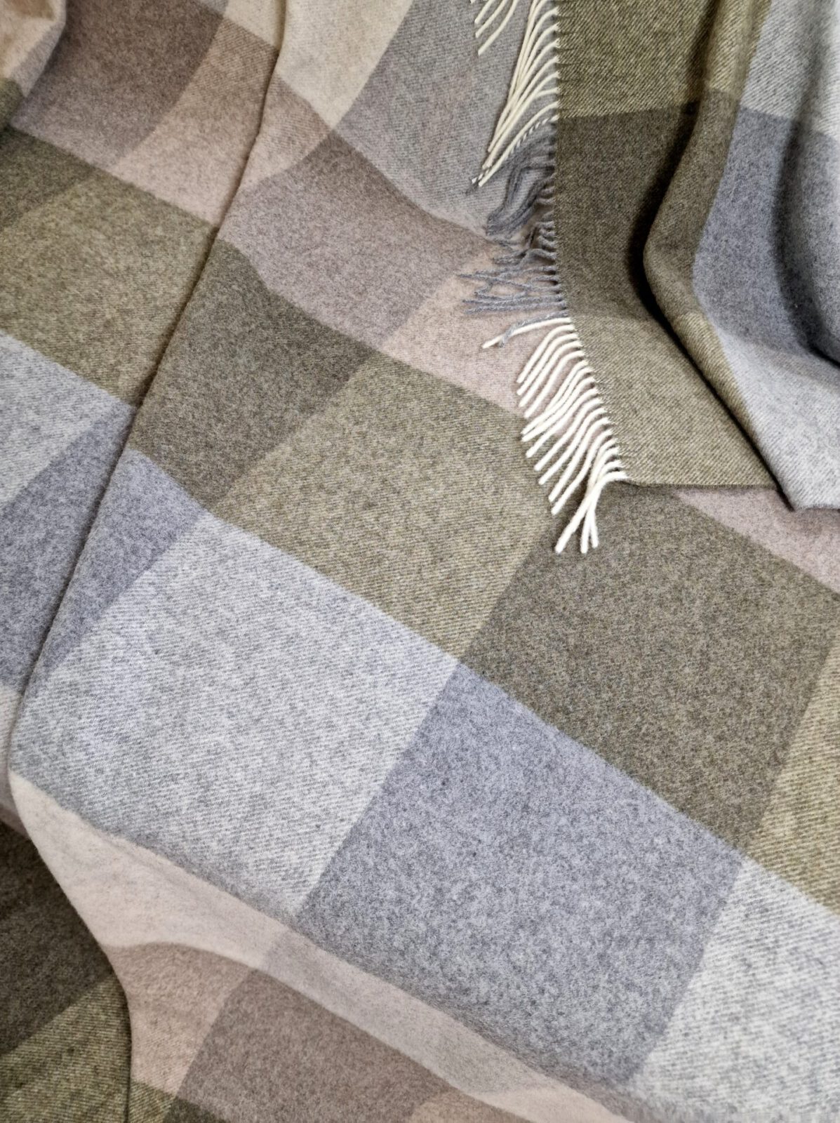 Wolldecken und Wollplaids