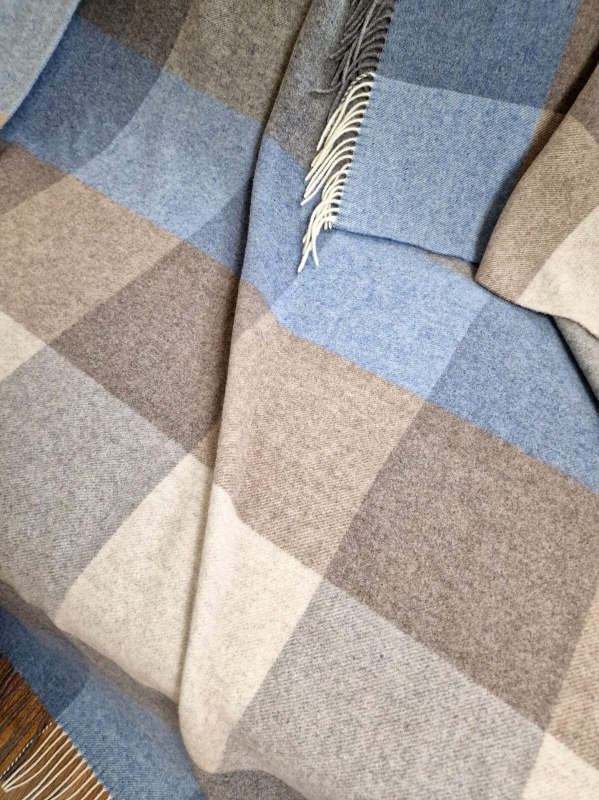 Wolldecken und Wollplaids
