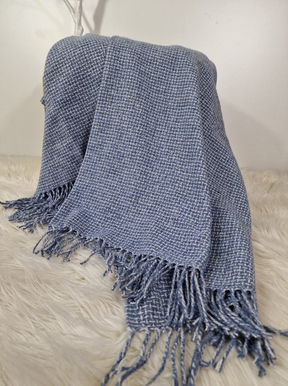 Wolldecken und Wollplaids