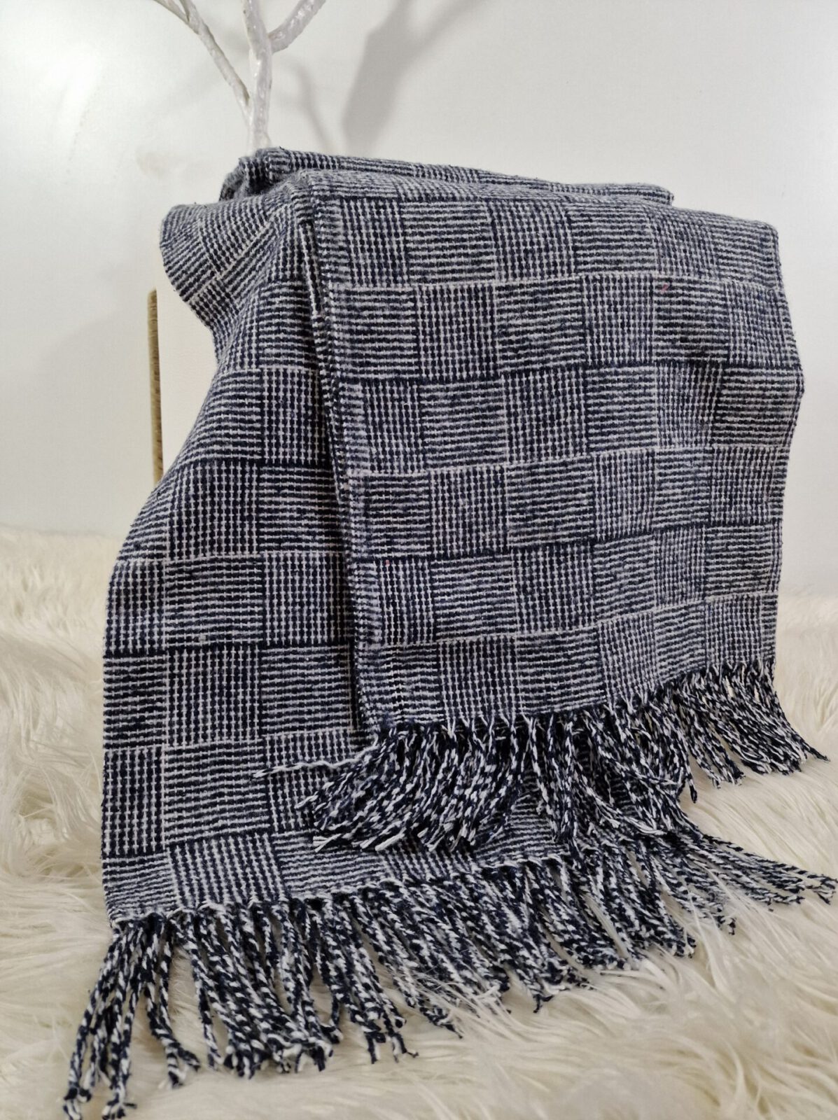 Wolldecken und Wollplaids