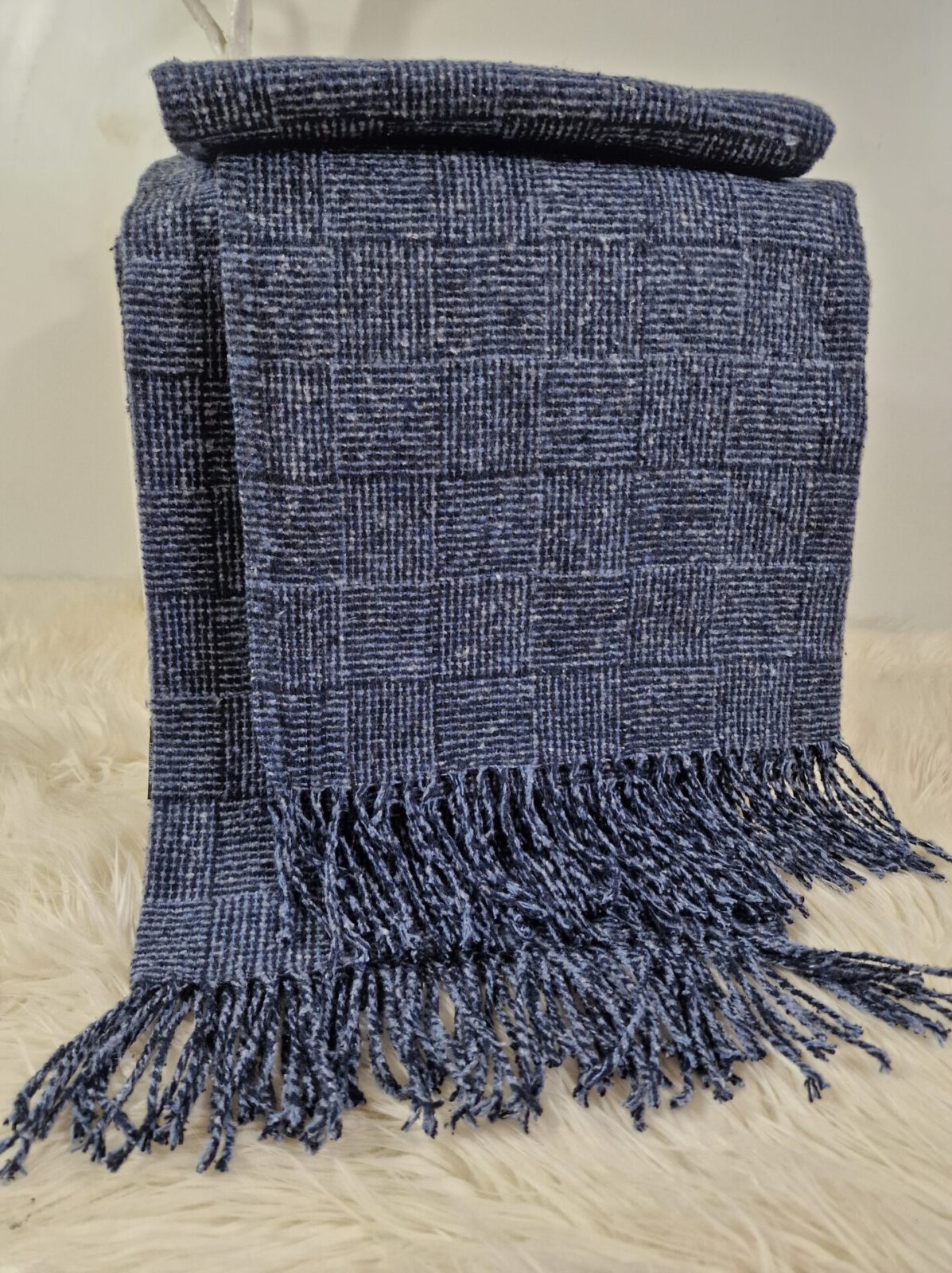 Wolldecken und Wollplaids