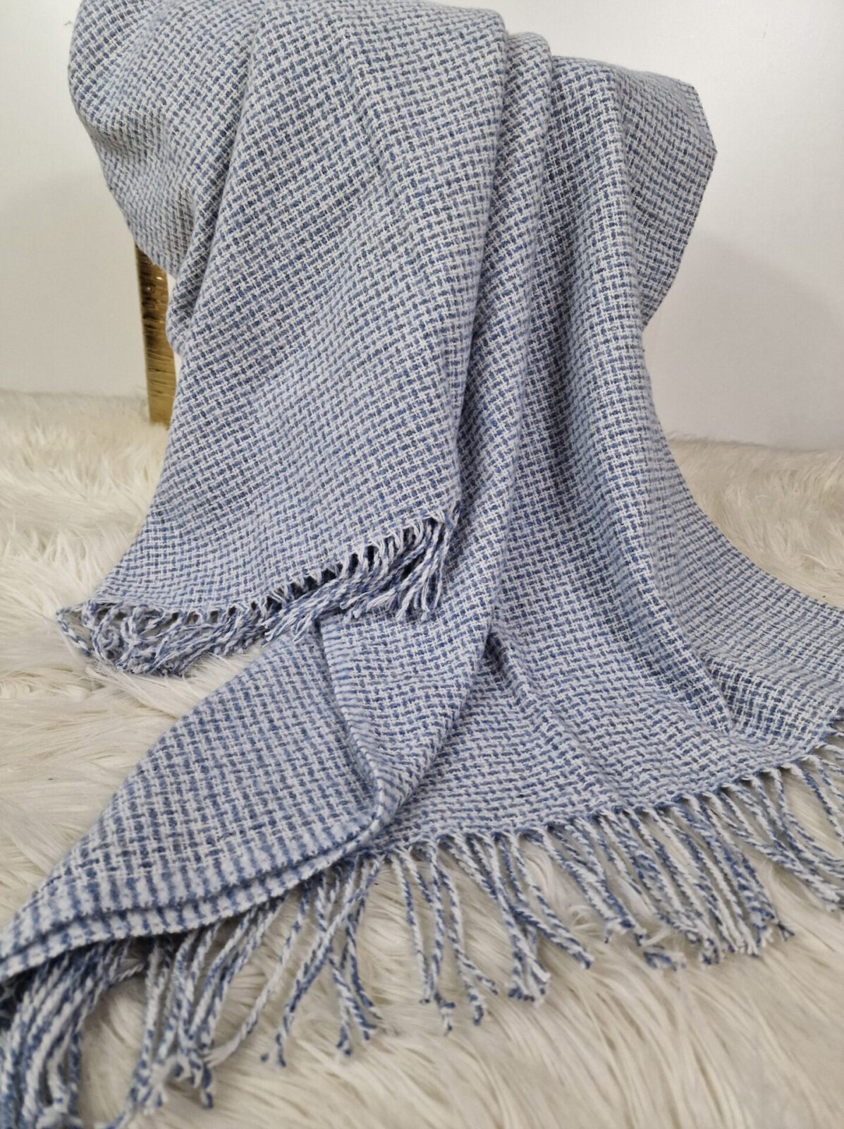 Wolldecken und Wollplaids