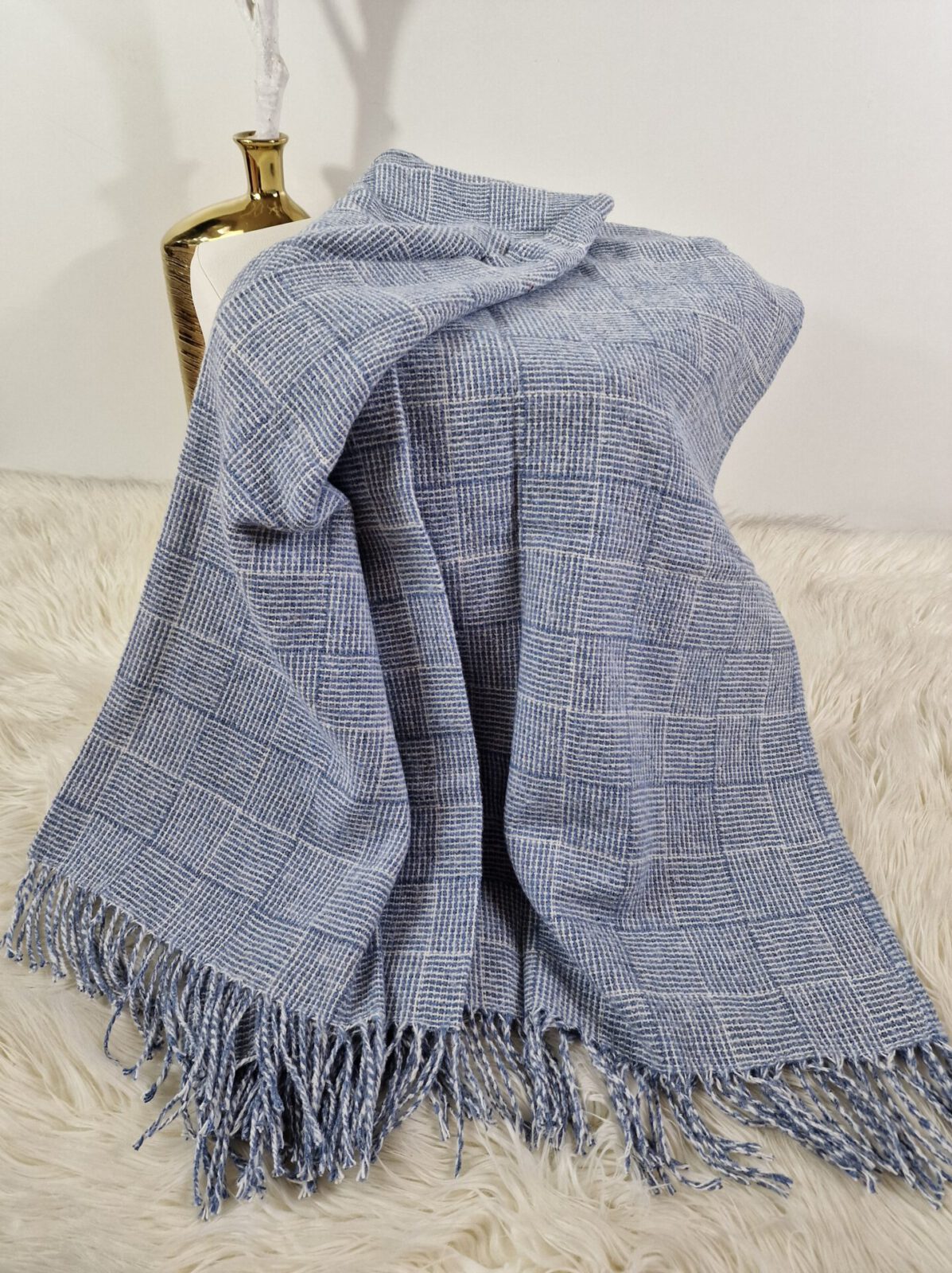 Wolldecken und Wollplaids
